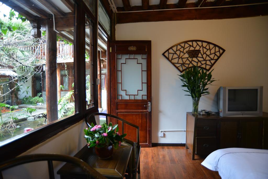 Lijiang Ancient Town International Youth Hostel Chambre photo